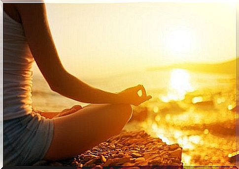 Woman in lotus position meditating