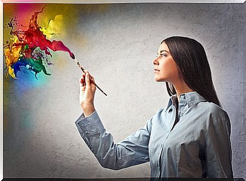 Woman painting with creativity