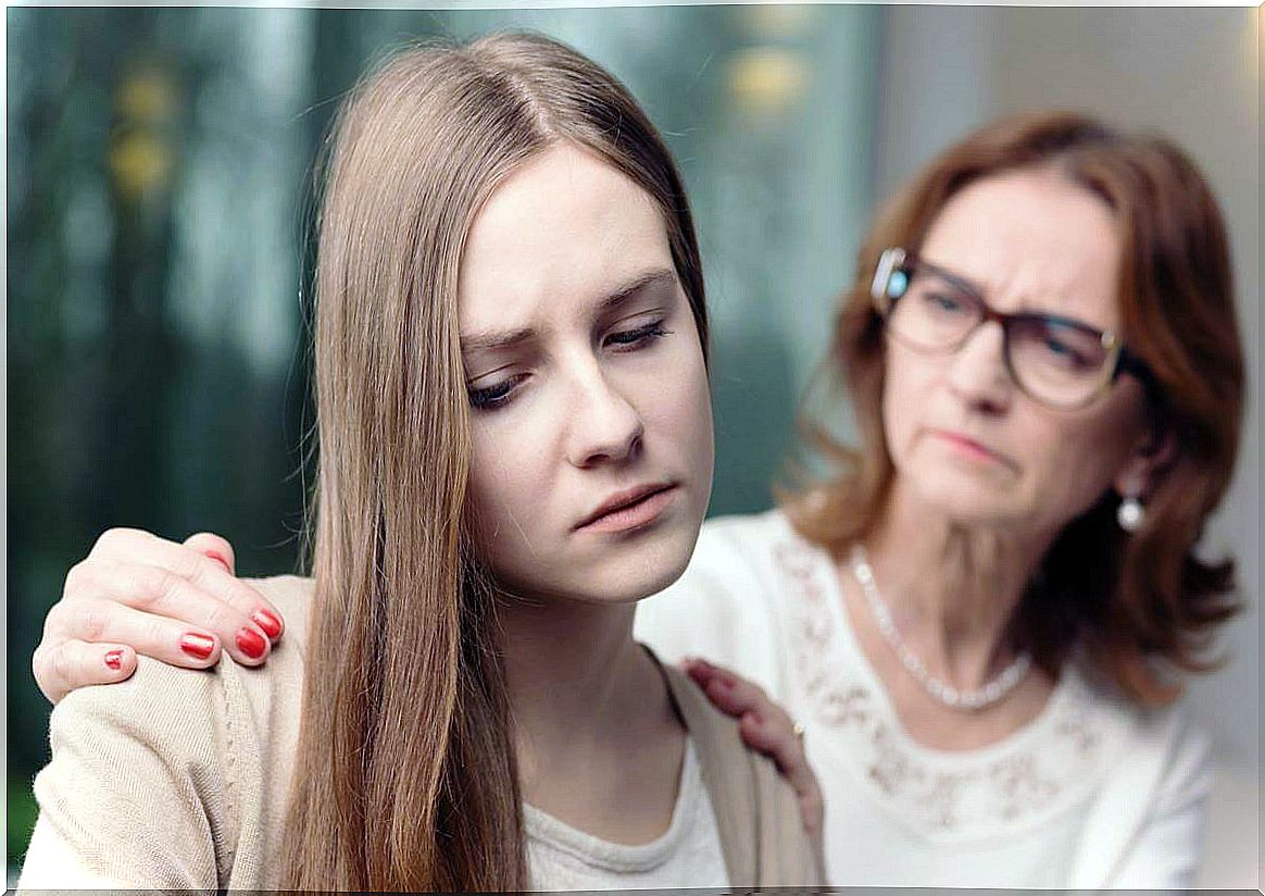 girl with her mother to represent at what ages mental health disorders appear