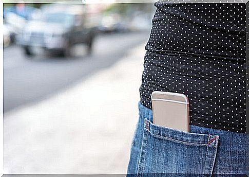 Mobile kept in a girl's pants pocket