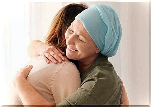 Sick woman hugging another