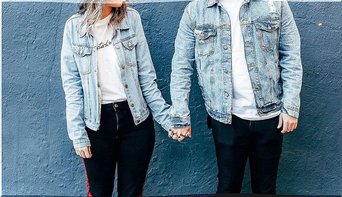 boy and girl wearing denim jackets to symbolize harmony in a couple relationship