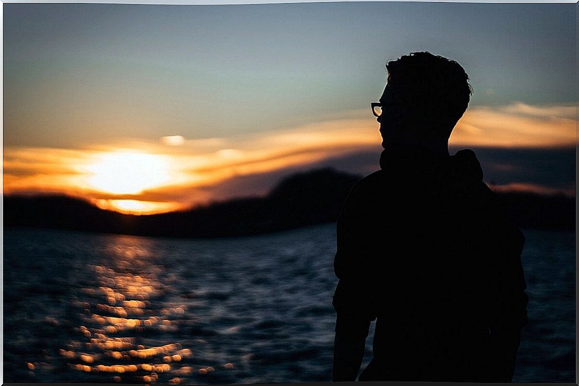 boy by the sea wondering developing his self-awareness