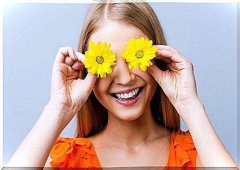 Woman with flowers in her eyes