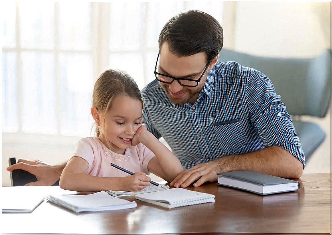 Father helping his daughter