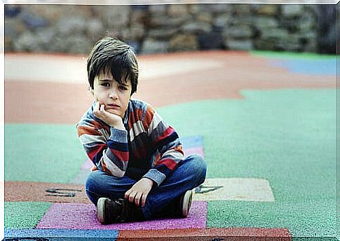 Boy sitting thinking