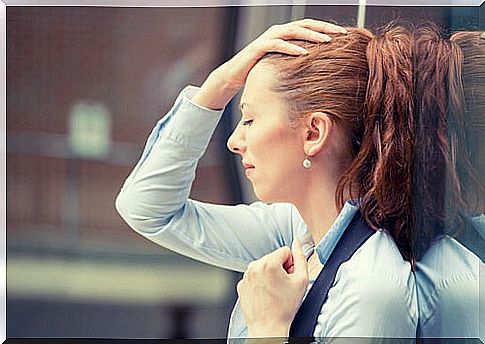 stressed-out-woman-with-hand-on-head