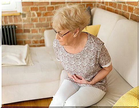 Senior woman with stomach pain