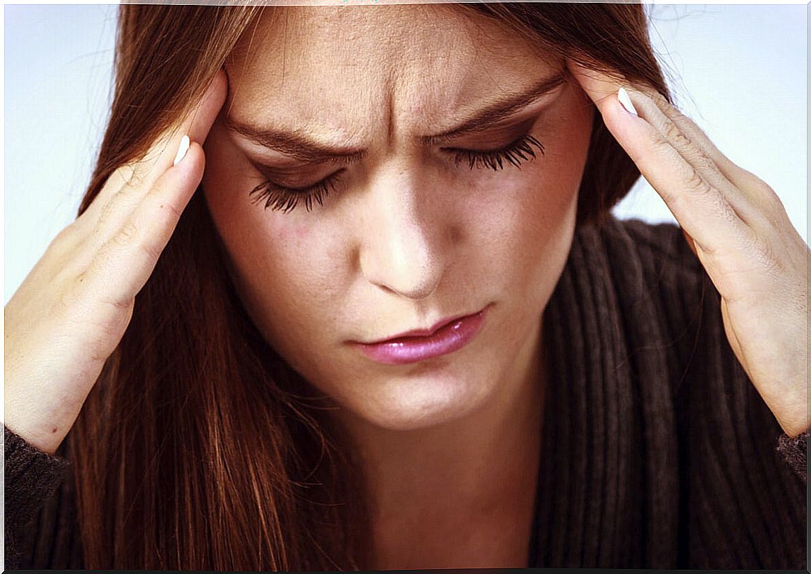 Woman with headaches from anxiety