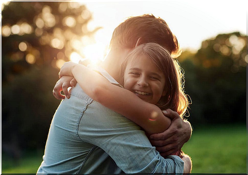 Father and daughter hugging