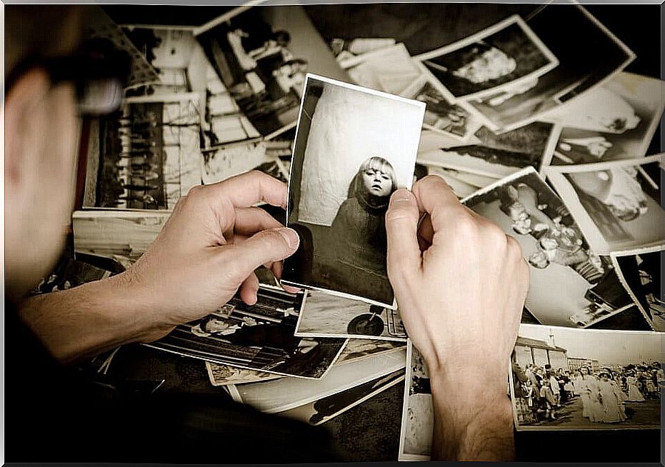 Man holding picture of a child